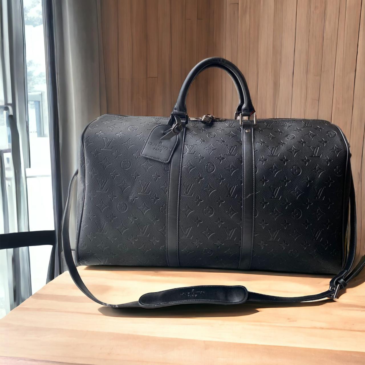 WhatsApp Image 2023-12-16 at 16.36.18_185a249f Louis Vuitton Black Embossed Duffle Bag