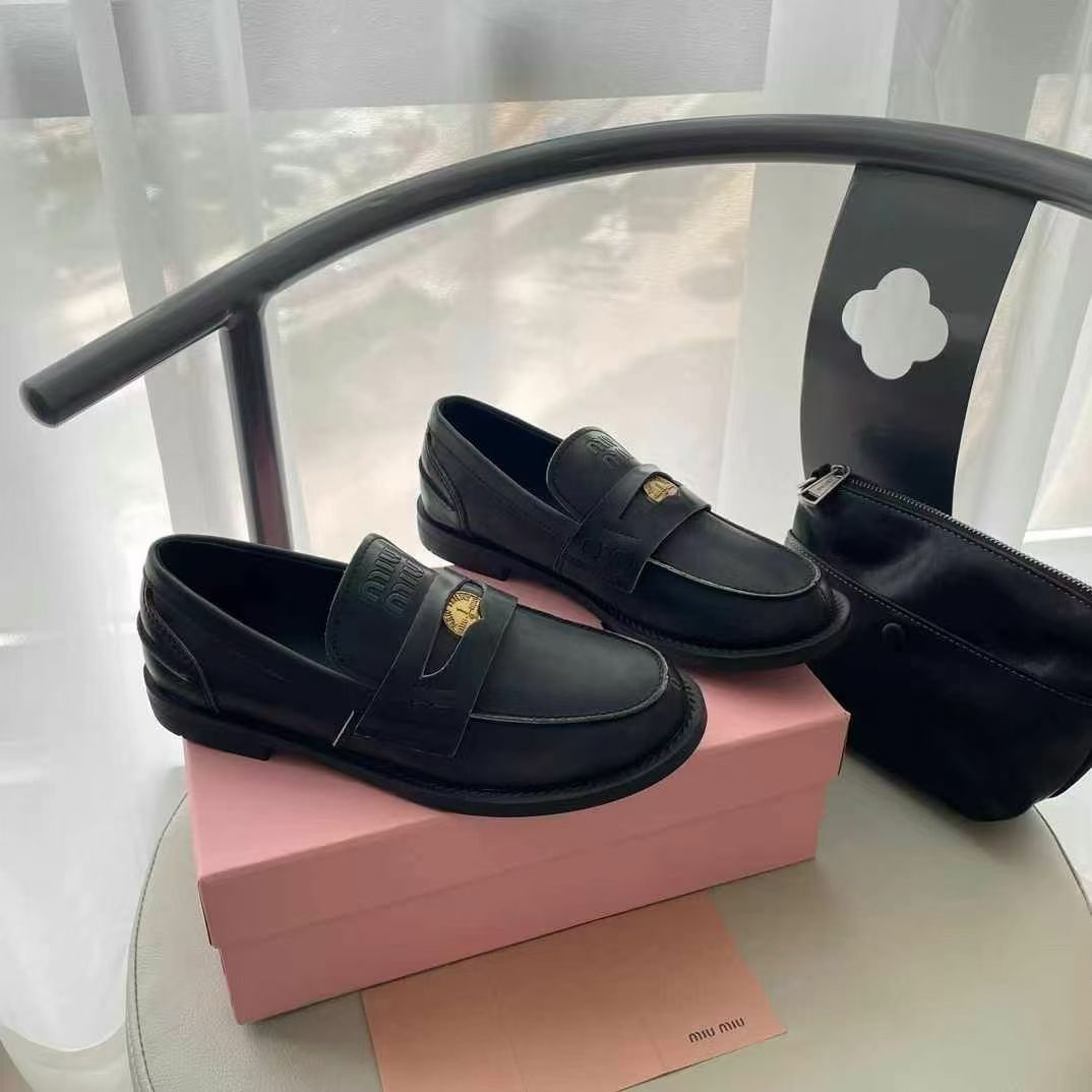WhatsApp Image 2025-02-15 at 1.28.22 PM Miu Miu Black Penny Loafer