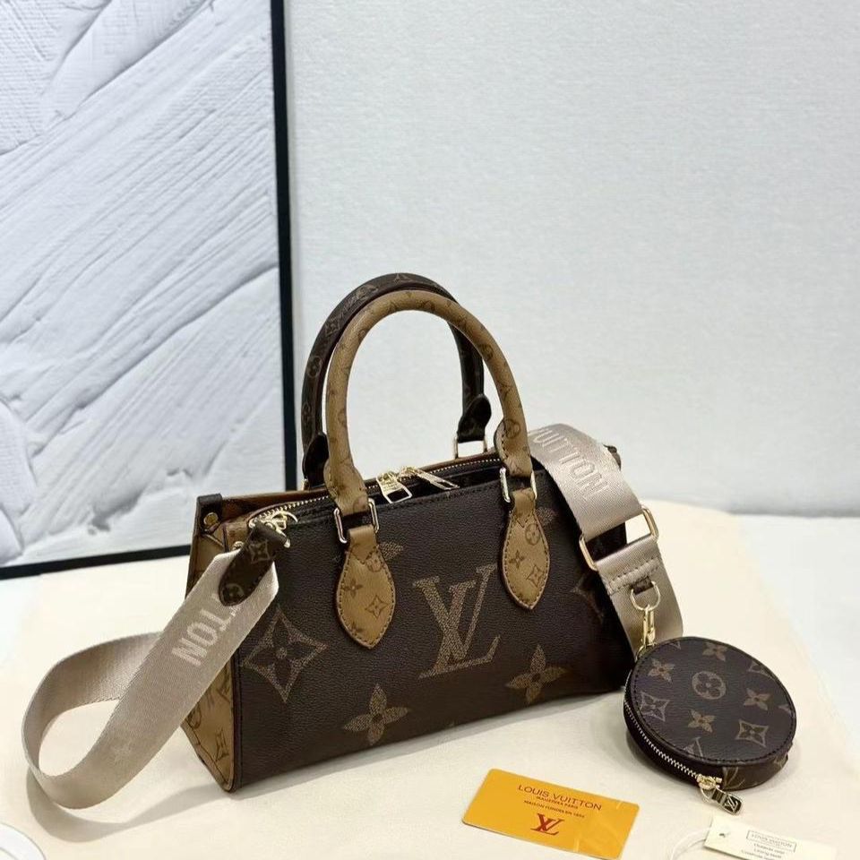 Louis Vuitton On the Go East West Handbag (With Box)