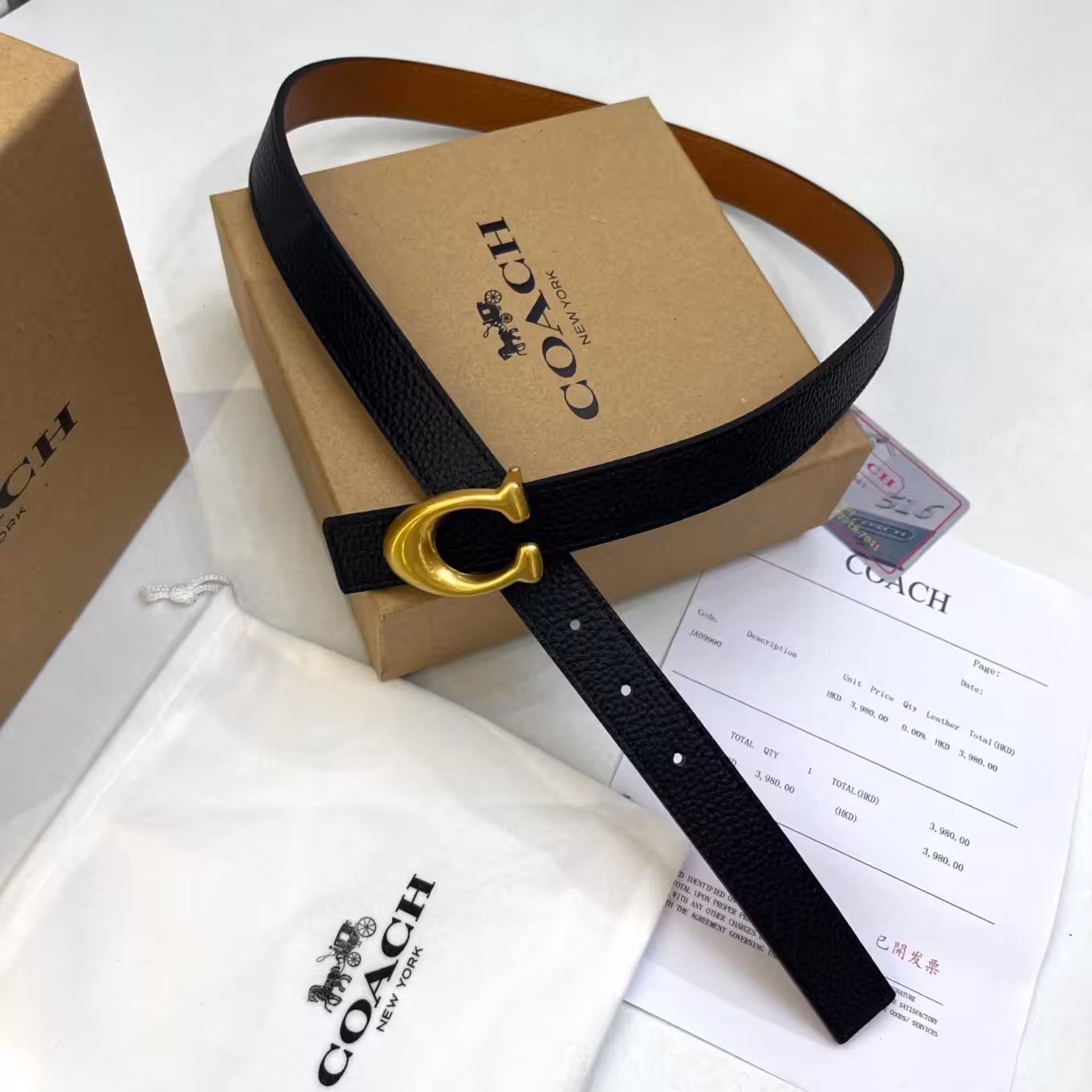 WhatsApp Image 2025-08-22 at 7.49.12 PM Coach Sculpted C Buckle Black and brown reversible Belt