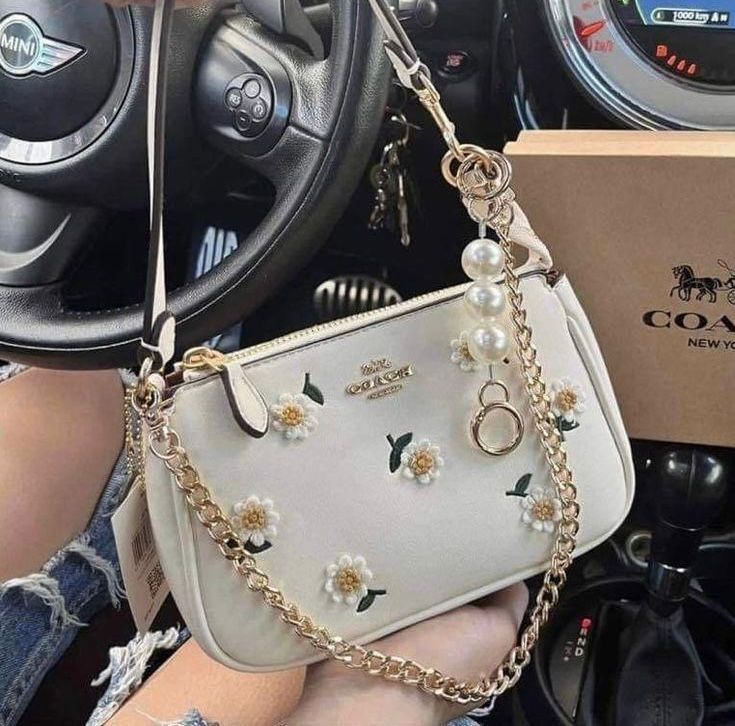 WhatsApp Image 2025-09-03 at 12.05.03_f4af3e8b Coach Nolita 19 White Flower Shoulder Bag (With Box)