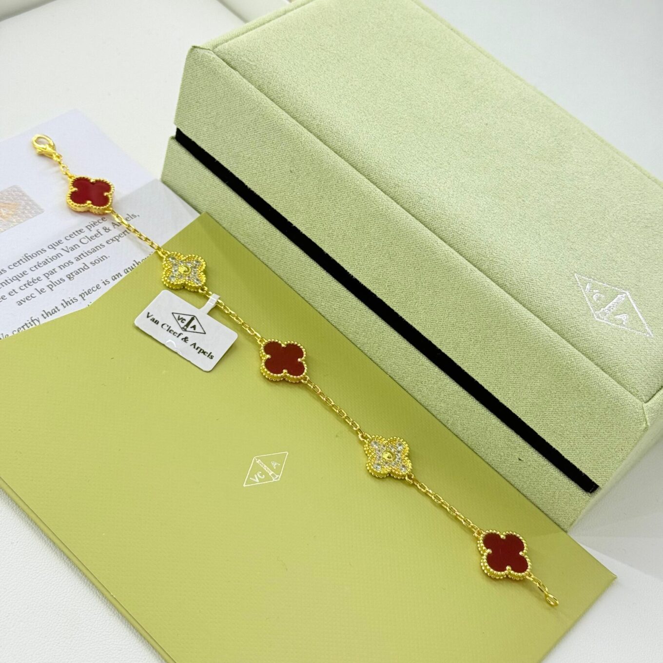 WhatsApp Image 2025-09-05 at 3.23.33 PM Van Cleef Alhambra Red & White Stone Gold Color Bracelet