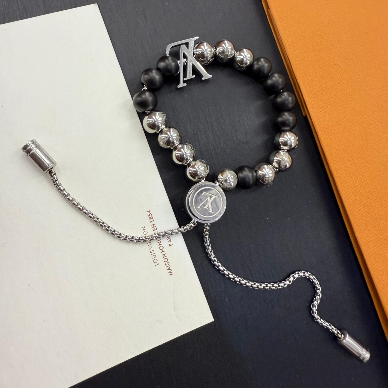 WhatsApp Image 2025-09-05 at 8.30.04 PM Louis Vuitton Black Stone Adjustable Metal Bracelet
