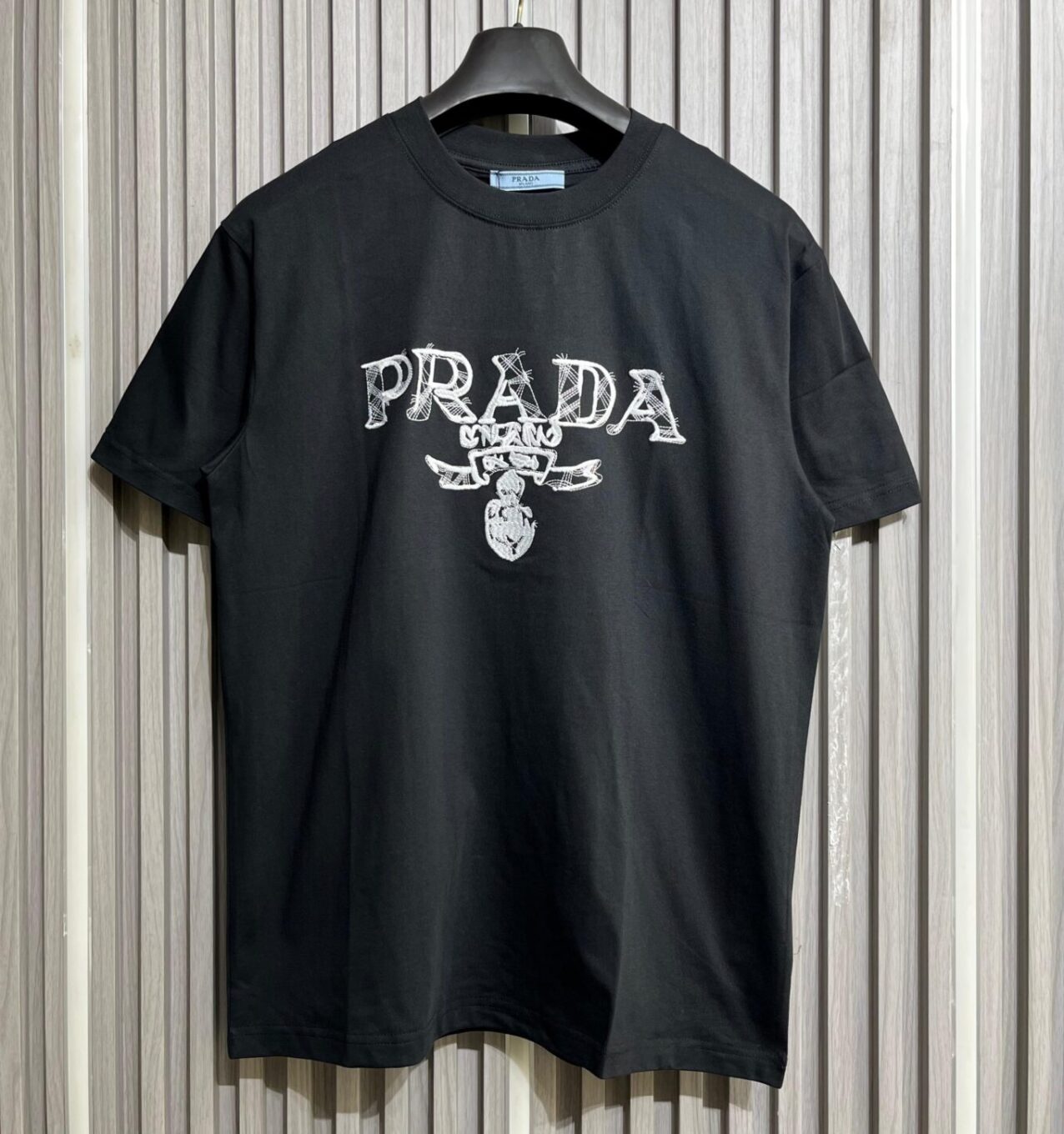 WhatsApp Image 2025-09-11 at 5.02.35 PM Prada Embroidered Logo Black Tshirt For Men