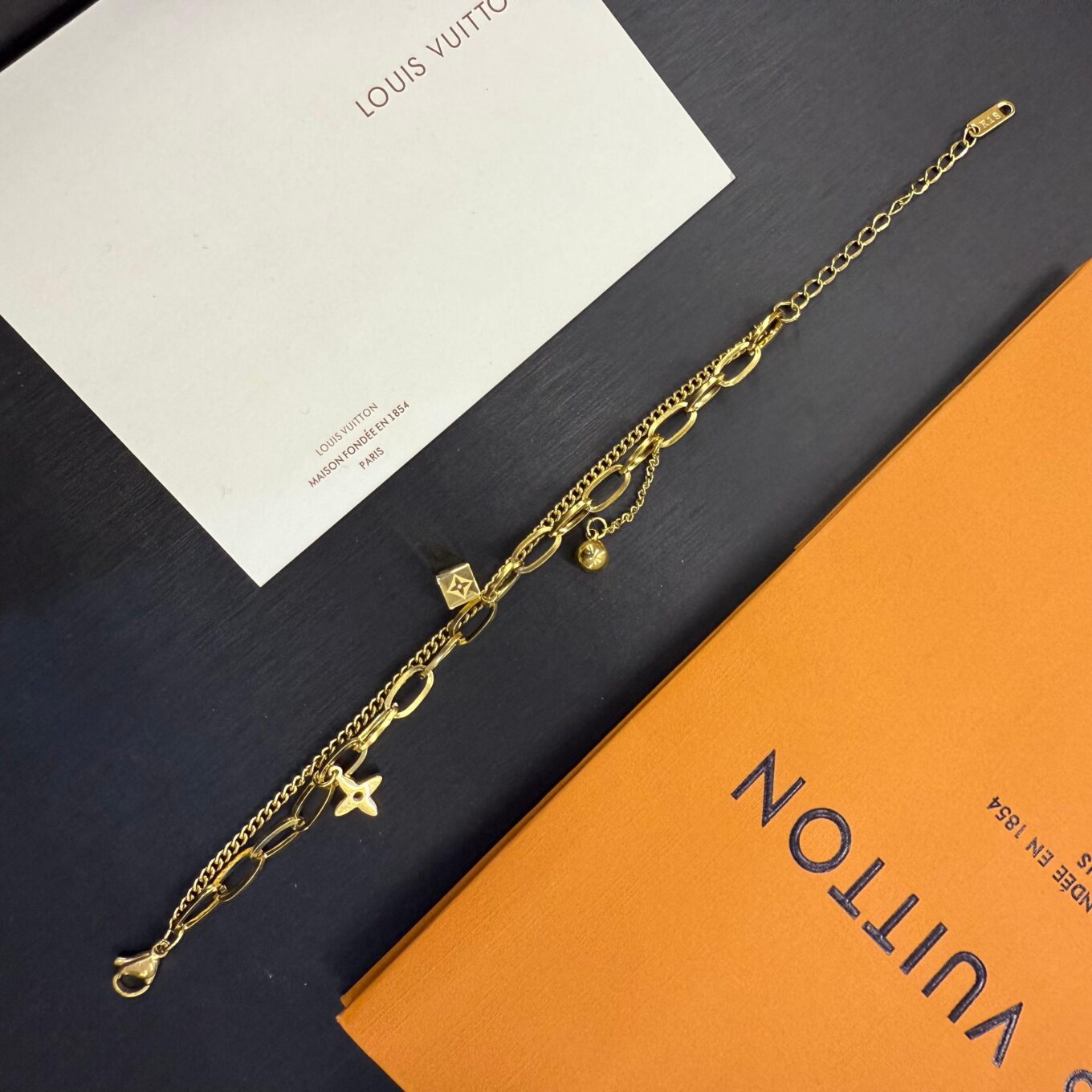 WhatsApp Image 2025-10-01 at 9.46.34 PM (1) Louis Vuitton Signature Cube Gold Bracelet