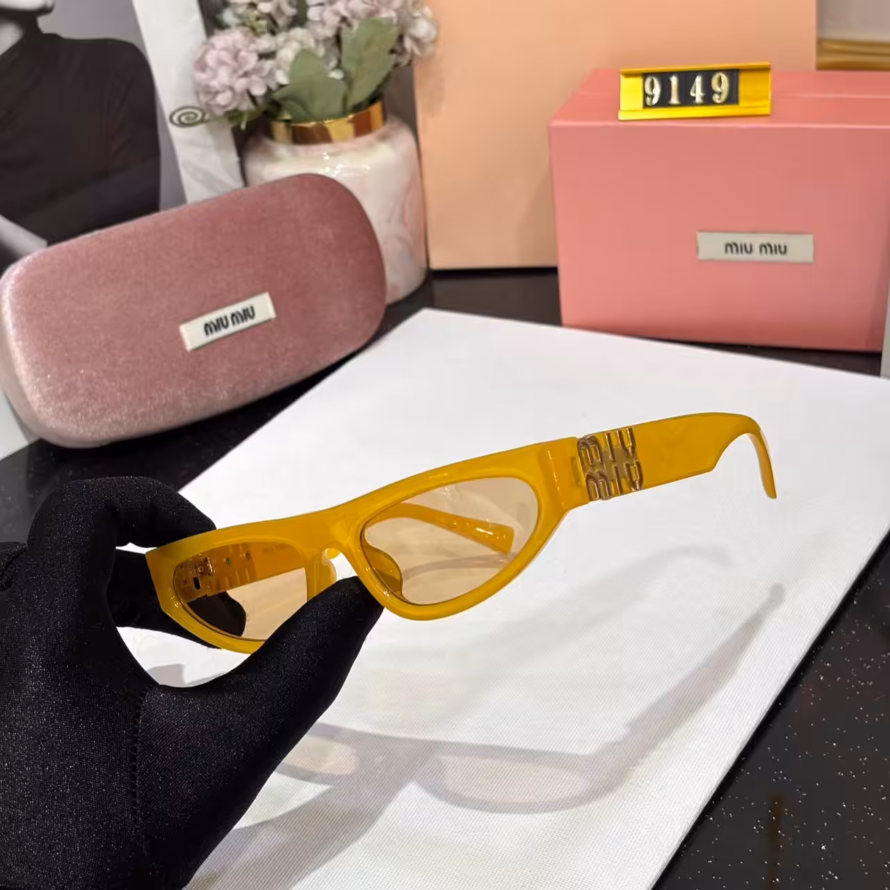 WhatsApp Image 2026-01-08 at 2.34.52 AM (1) Miu Miu Cat eye Yellow Sunglass For Women