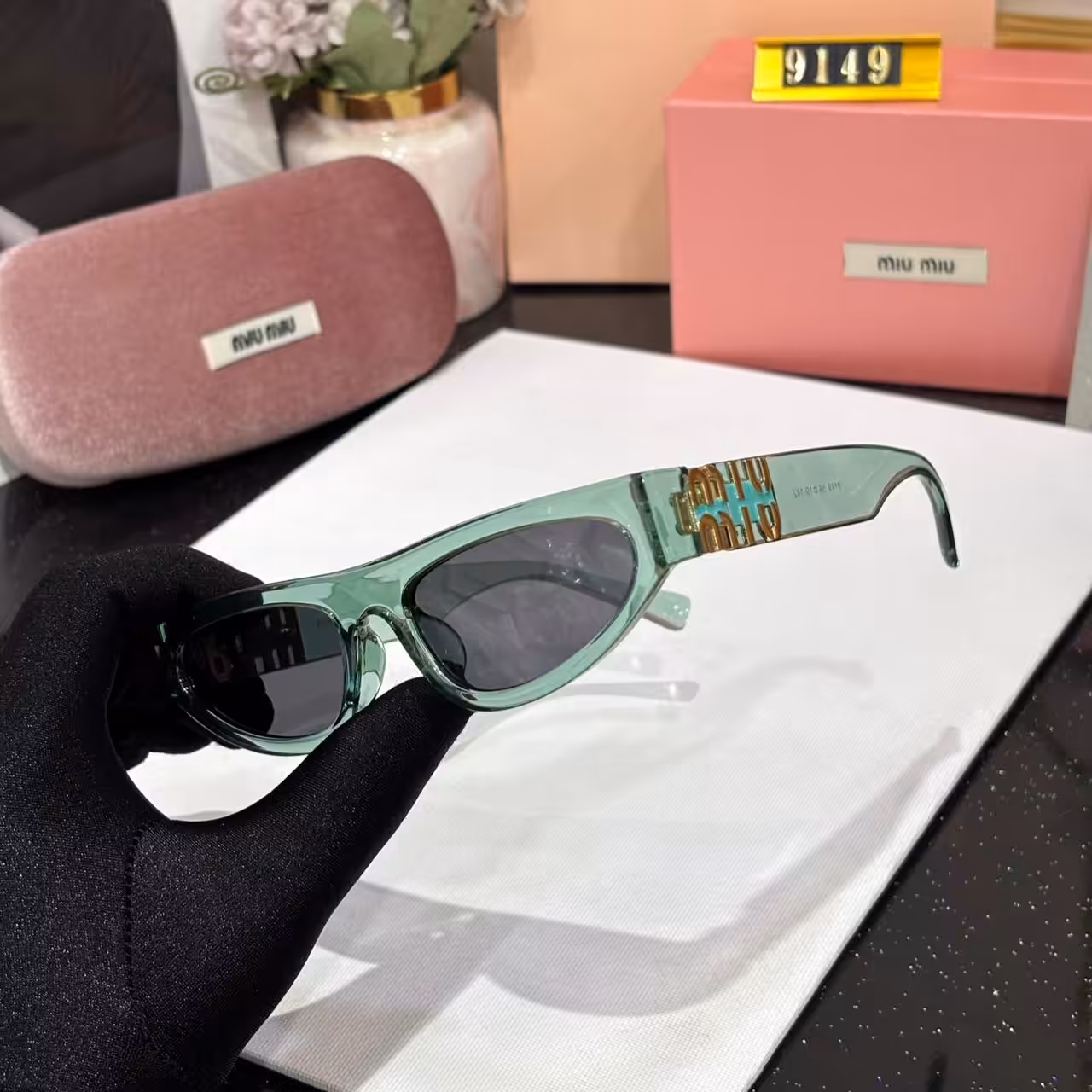 WhatsApp Image 2026-01-08 at 2.36.37 AM (1) Miu Miu Cat eye Green Black Sunglass For Women