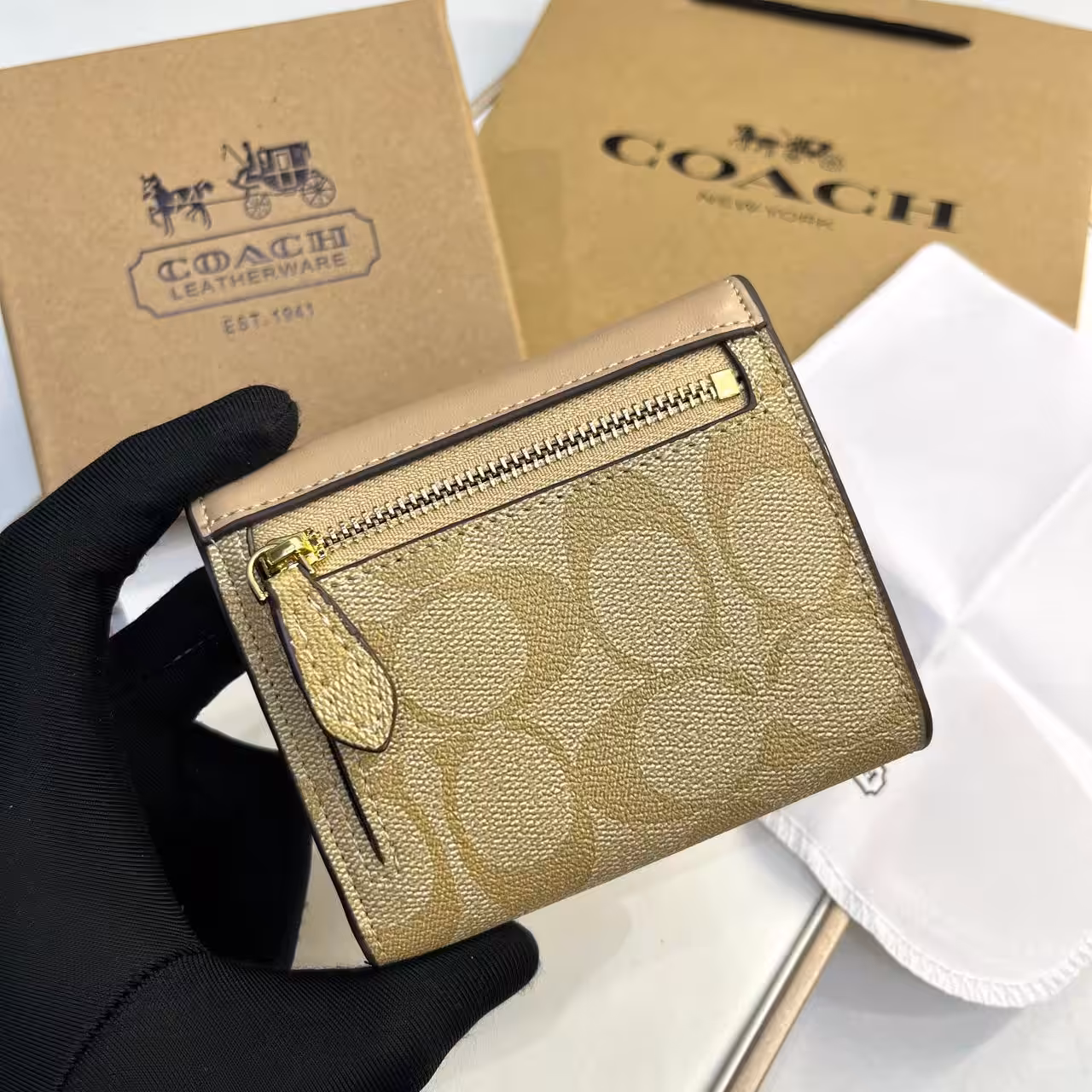 WhatsApp Image 2025-12-02 at 6.58.46 PM (1) Coach three Fold Apricot Beige Wallet