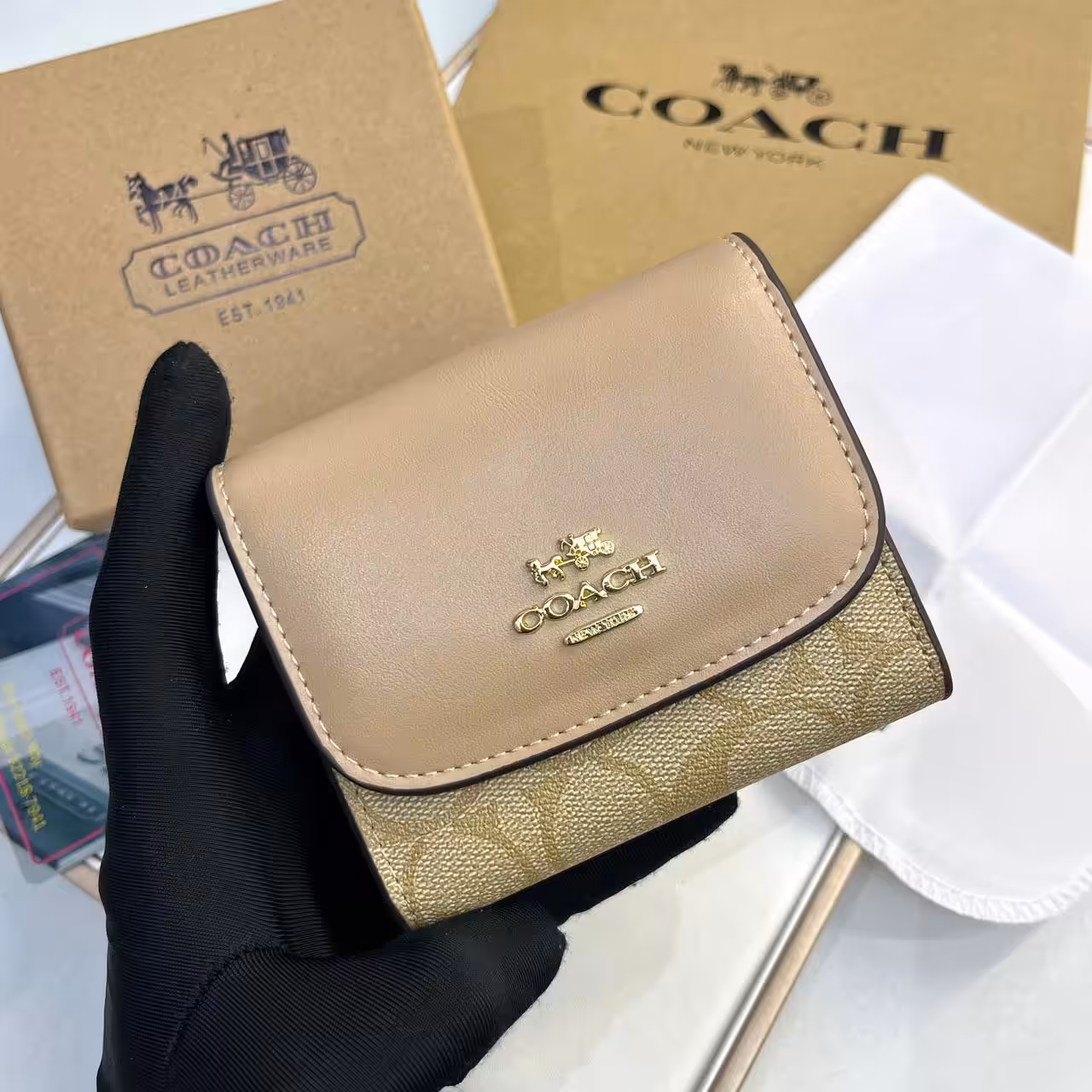 WhatsApp Image 2025-12-02 at 6.58.47 PM Coach three Fold Apricot Beige Wallet