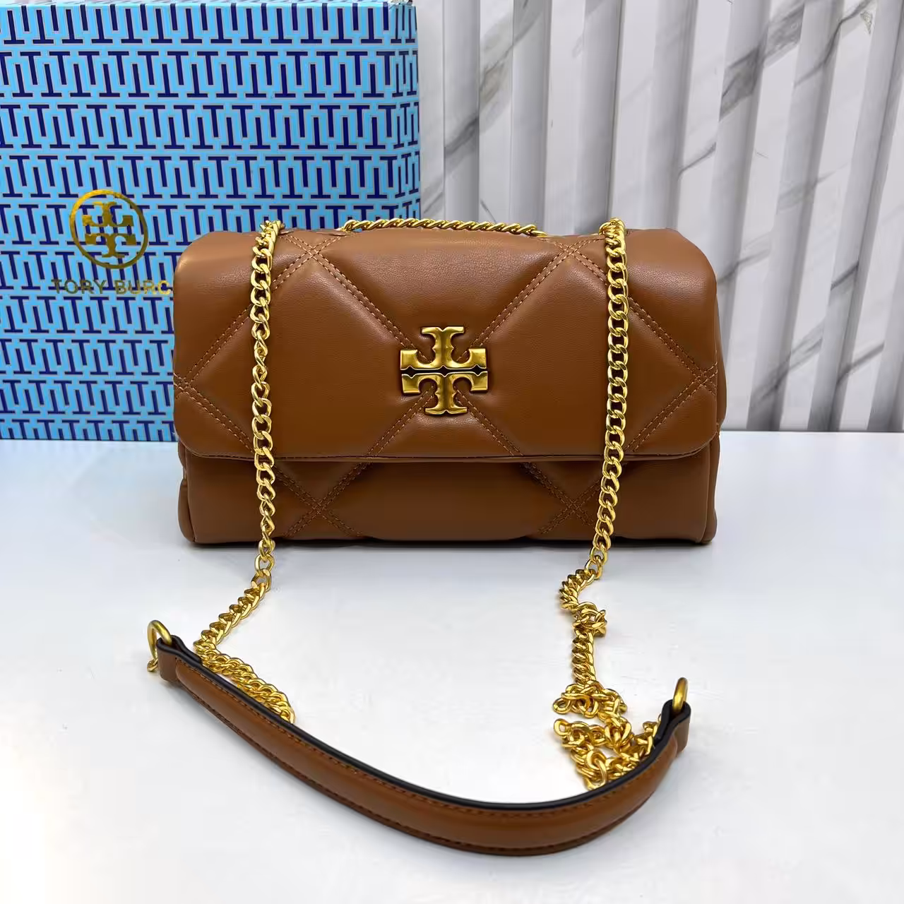 WhatsApp Image 2026-01-04 at 4.39.22 PM Tory Burch Diamond Kira Brown Color Sling Bag (With Box)
