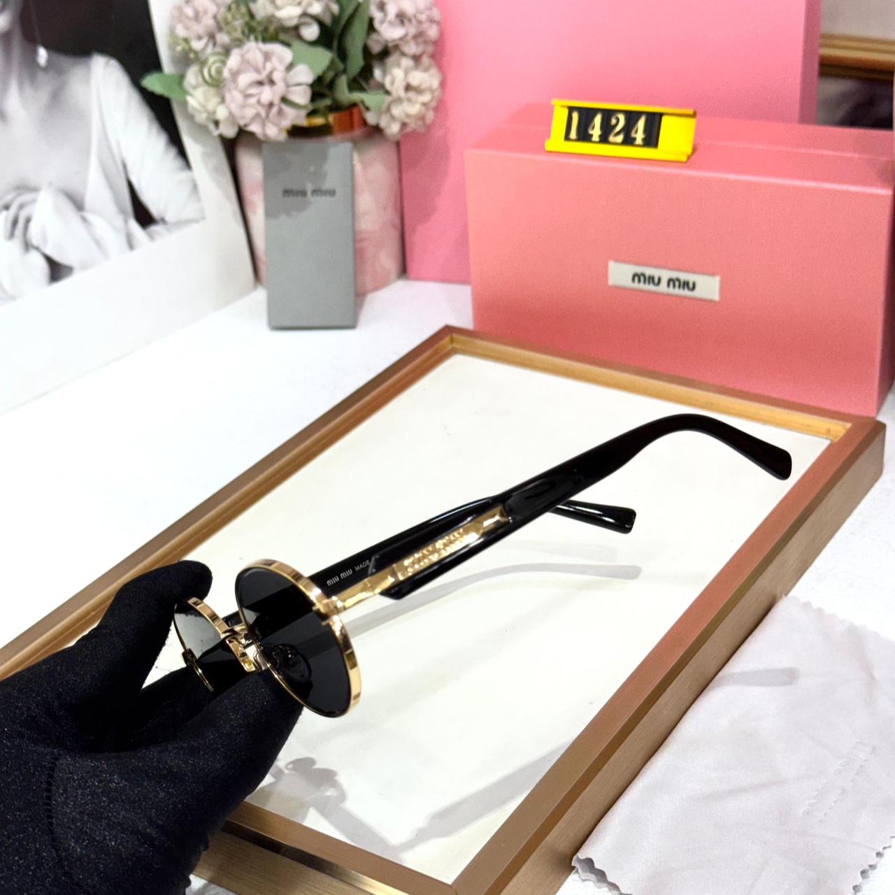 Miu Miu Gold Round Sunglasses for Women