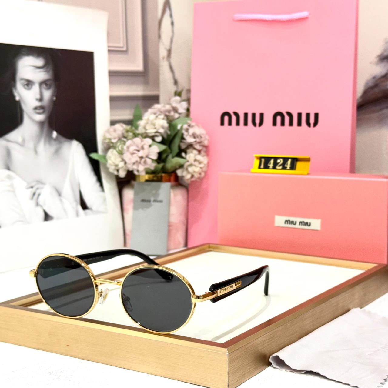 Miu Miu Gold Round Sunglasses for Women