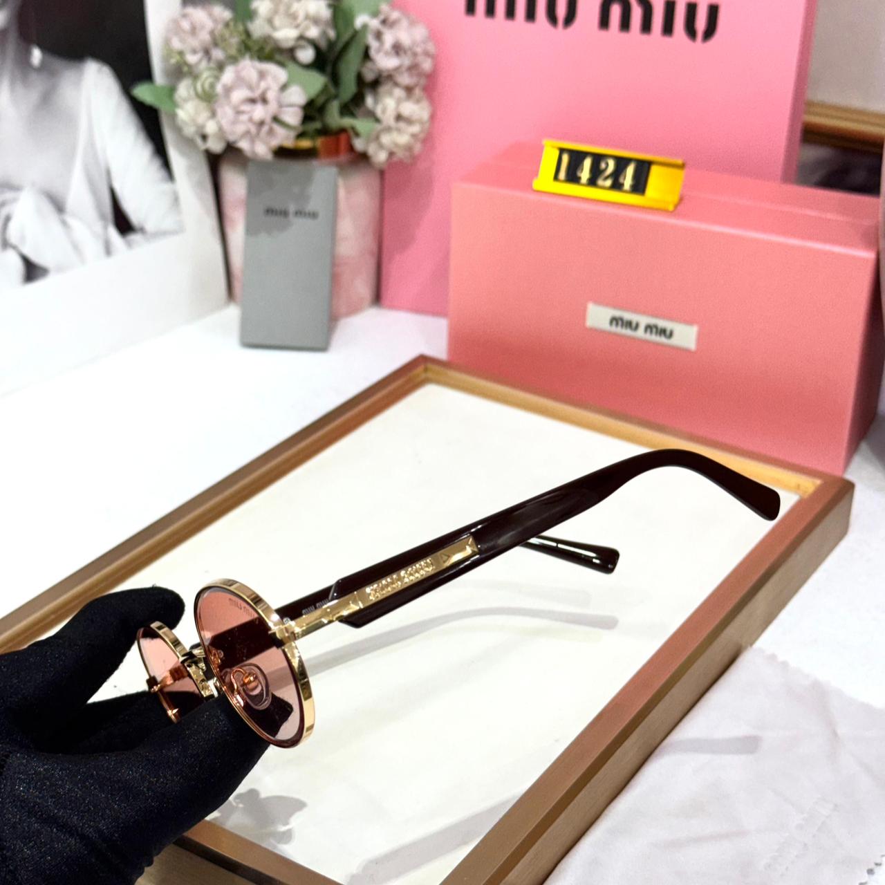WhatsApp Image 2026-01-09 at 7.02.51 PM (1) Miu Miu Gold Round Pink Sunglasses for Women