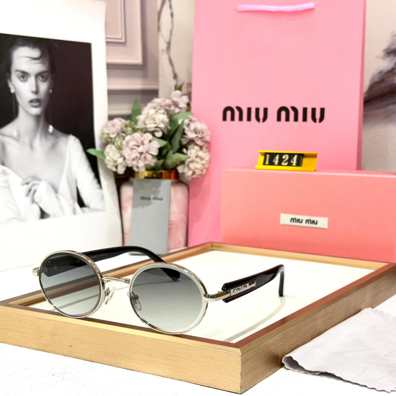 Miu Miu Silver Round Black Sunglasses for Women