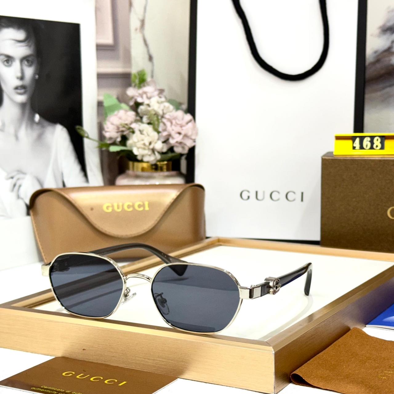 Gucci Silver Oval Unisex Sunglasses